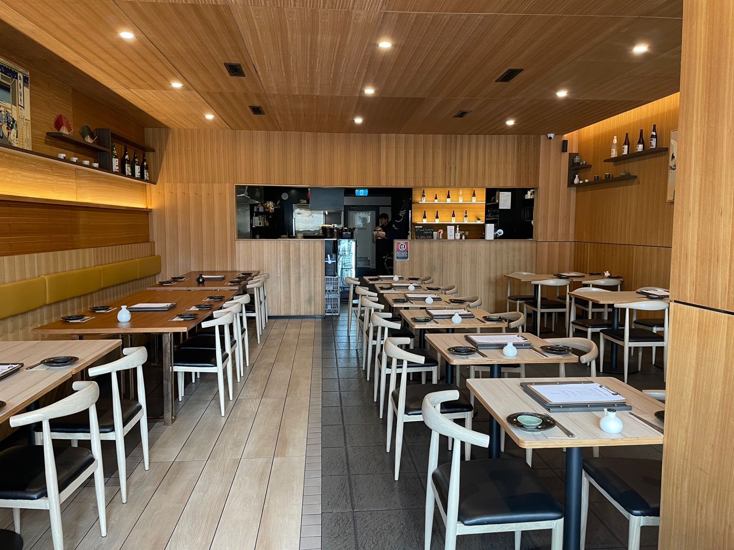 Tables set for service at Yuzu Epping